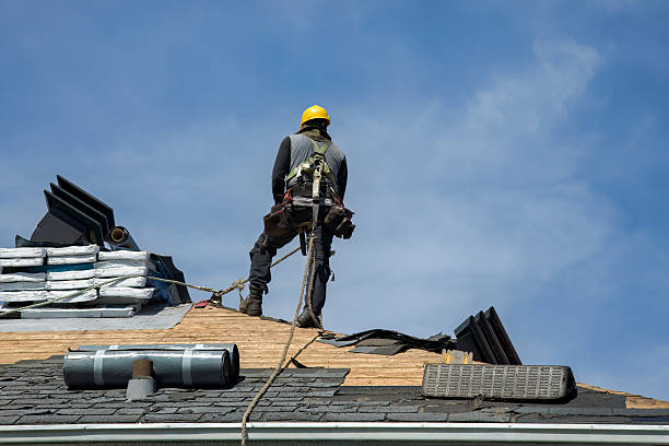 Professional Roof Replacement technician working in Claypool, IN